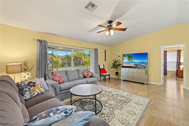 tiled living area with visible vents, baseboards, a ceiling fan, and vaulted ceiling