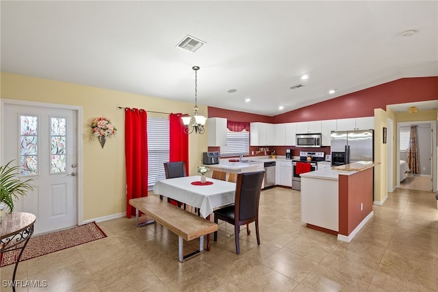 dining area featuring baseboards, visible vents, an inviting chandelier, lofted ceiling, and recessed lighting