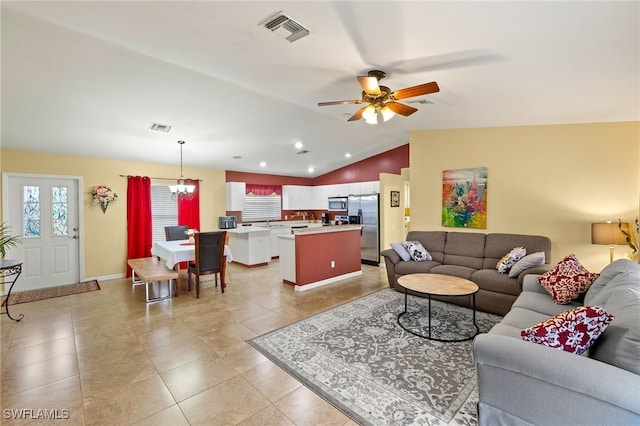 living room with lofted ceiling, light tile patterned flooring, ceiling fan with notable chandelier, and visible vents