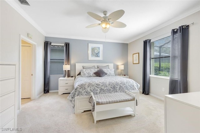 bedroom with light carpet, visible vents, baseboards, a ceiling fan, and crown molding