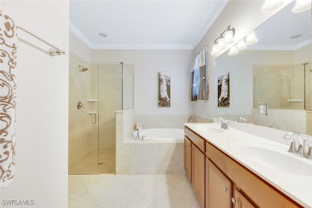 bathroom with crown molding, a garden tub, a sink, and a shower stall