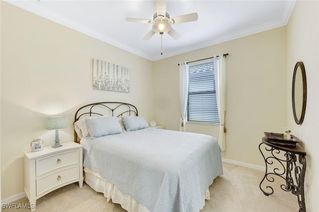 bedroom featuring light carpet, a ceiling fan, baseboards, and crown molding