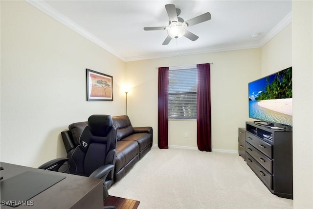 office area with light carpet, baseboards, a ceiling fan, and crown molding