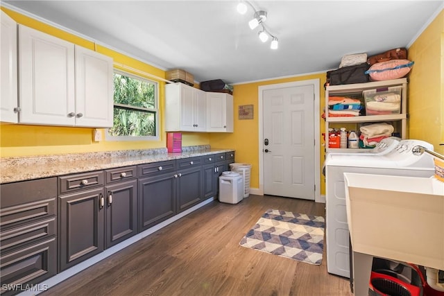 1622 Piney Rd, North Fort Myers, FL 33903 - clothes washing area featuring cabinet space, washing machine and dryer, and dark wood-style floors