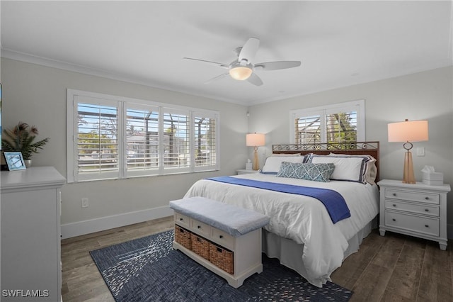 bedroom with ceiling fan, baseboards, wood finished floors, and ornamental molding