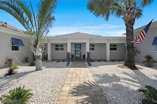 view of front of property featuring stucco siding