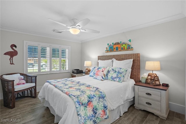 bedroom featuring visible vents, baseboards, a ceiling fan, dark wood finished floors, and crown molding