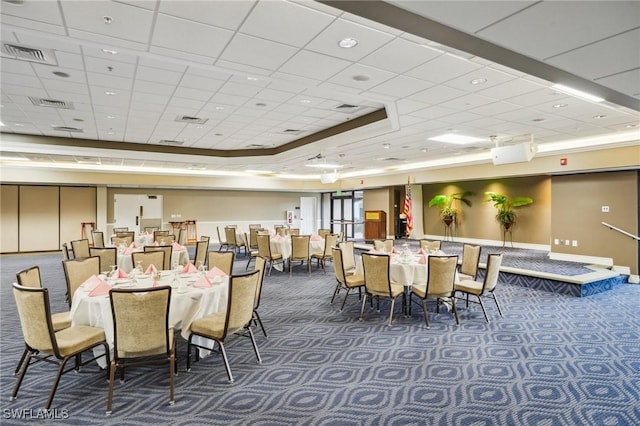 dining room with carpet flooring and visible vents