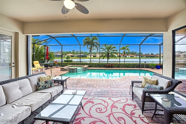 view of pool featuring a lanai, an outdoor living space, a patio, and ceiling fan