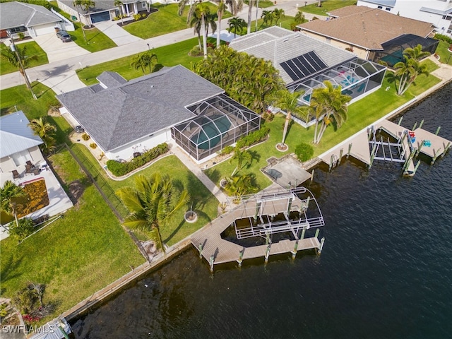 aerial view featuring a water view and a residential view