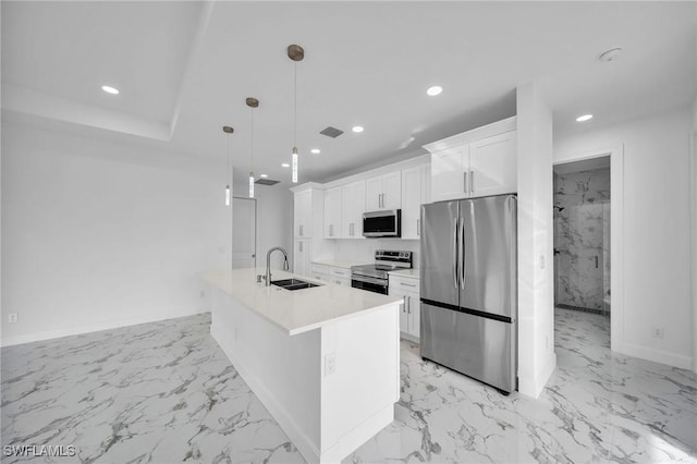 kitchen with recessed lighting, a sink, white cabinetry, marble finish floor, and appliances with stainless steel finishes