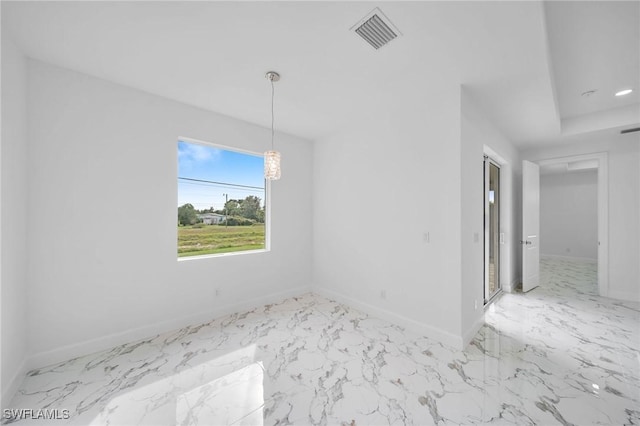 unfurnished room with marble finish floor, baseboards, visible vents, and recessed lighting