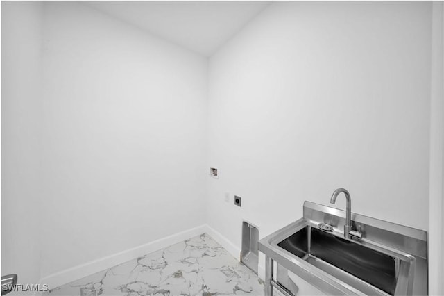 laundry room with hookup for an electric dryer, laundry area, a sink, baseboards, and marble finish floor