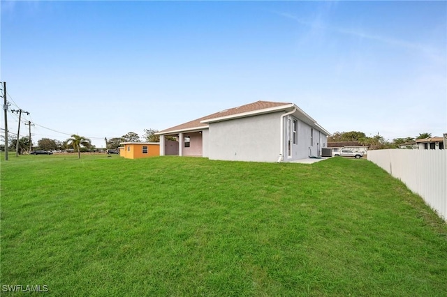 view of yard featuring fence