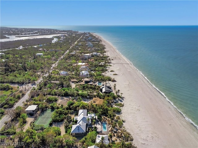 aerial view featuring a water view and a view of the beach