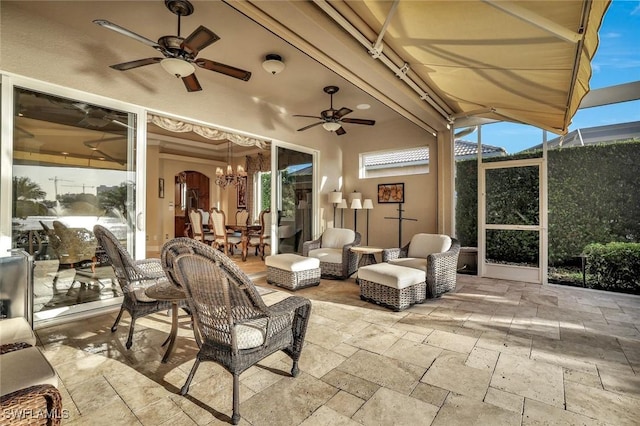 view of patio / terrace featuring an outdoor living space and ceiling fan