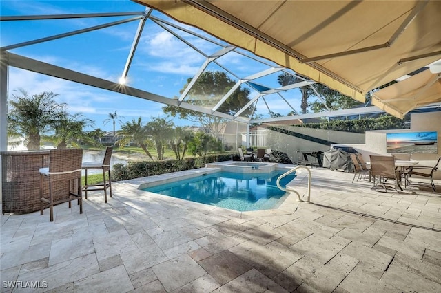 view of swimming pool with glass enclosure, a patio, and a pool with connected hot tub