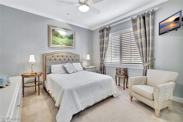 bedroom featuring baseboards, light carpet, a ceiling fan, and crown molding