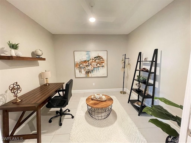 home office featuring light tile patterned flooring and baseboards