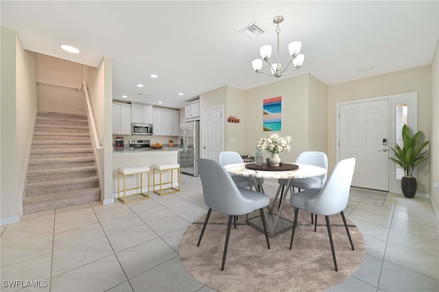 dining area with recessed lighting, stairway, a chandelier, and light tile patterned flooring