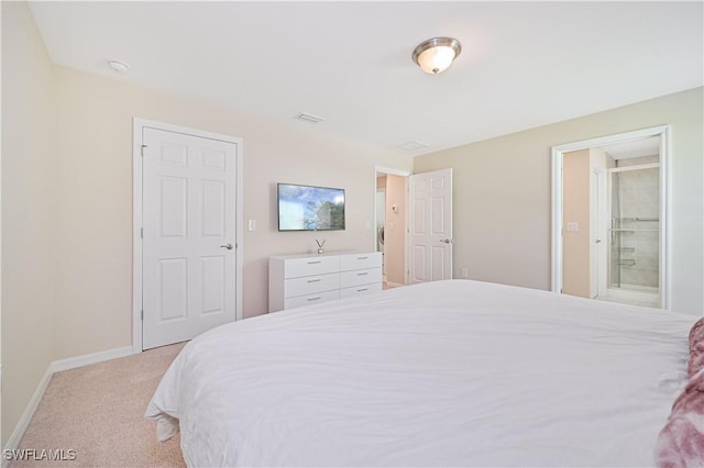 bedroom with light carpet, visible vents, and baseboards