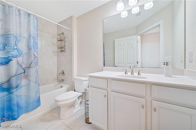 full bathroom with tile patterned flooring, shower / tub combo with curtain, vanity, and toilet