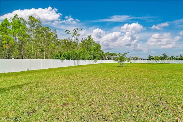 view of yard with fence