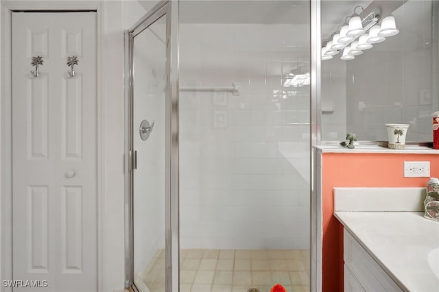 full bath with a shower stall and vanity