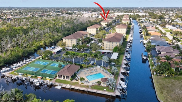 aerial view featuring a water view and a residential view