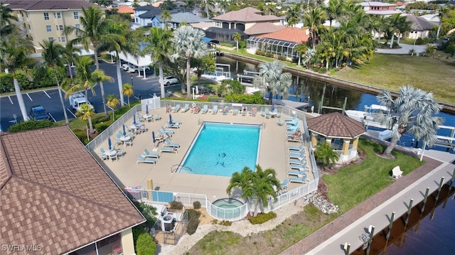 aerial view with a residential view and a water view