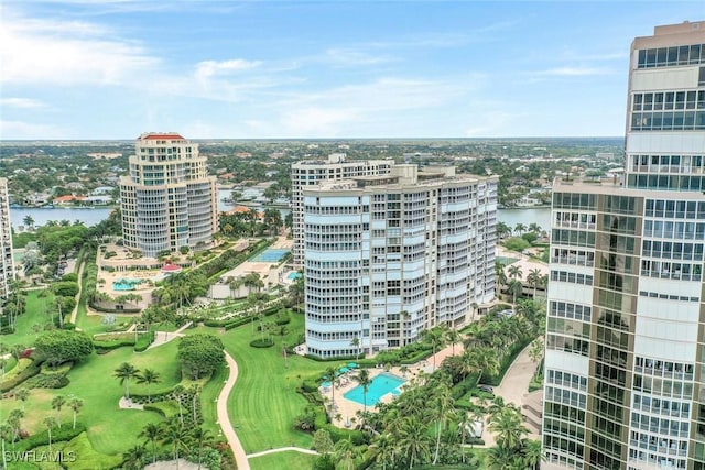 drone / aerial view with a view of city and a water view