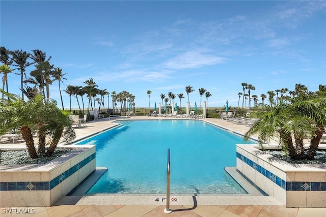 pool with a patio area