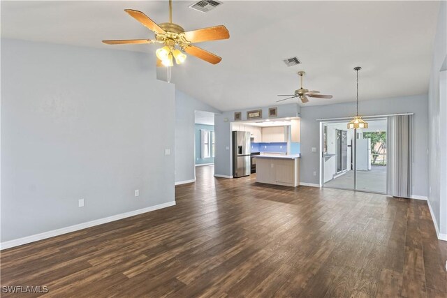 11253 Rabun Gap Dr, North Fort Myers, FL 33917 - unfurnished living room featuring ceiling fan, healthy amount of natural light, baseboards, dark wood-style flooring, and lofted ceiling