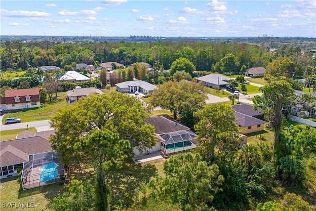 aerial view with a wooded view