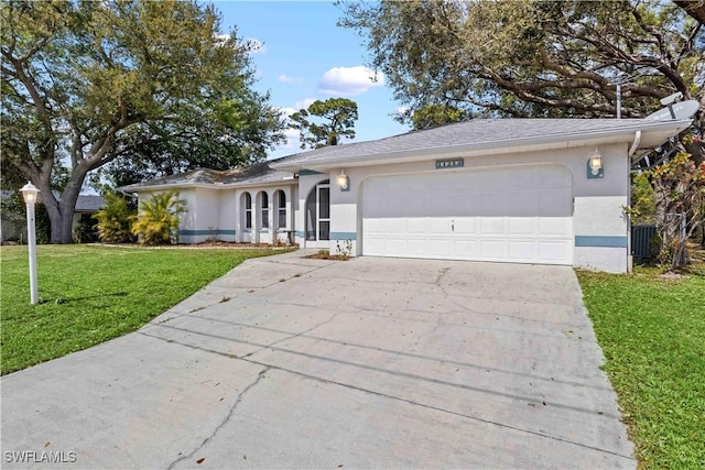 ranch-style home with a garage, driveway, a front lawn, and stucco siding