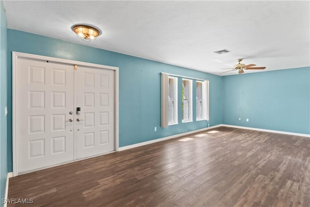 11253 Rabun Gap Dr, North Fort Myers, FL 33917 - entryway featuring ceiling fan, wood finished floors, and baseboards