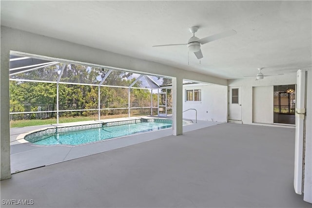 11253 Rabun Gap Dr, North Fort Myers, FL 33917 - swimming pool featuring ceiling fan, a patio area, and glass enclosure