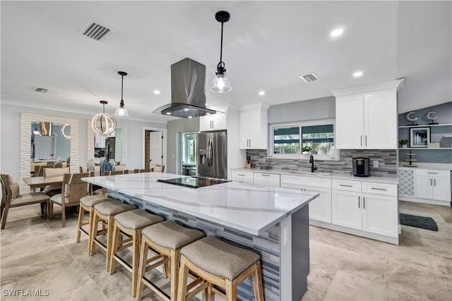 kitchen featuring a sink, white cabinets, backsplash, stainless steel fridge with ice dispenser, and island exhaust hood