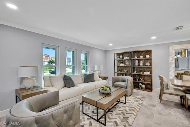 living room featuring recessed lighting, visible vents, and baseboards