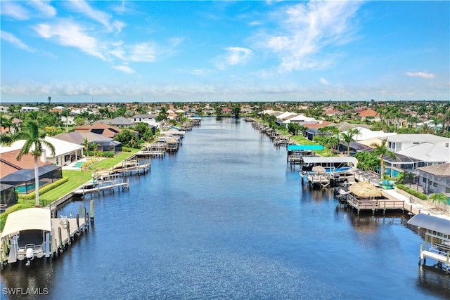 bird's eye view with a water view and a residential view