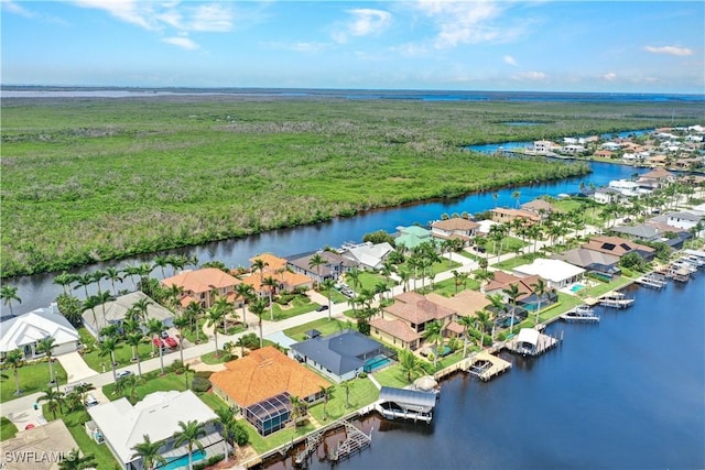 aerial view with a residential view and a water view