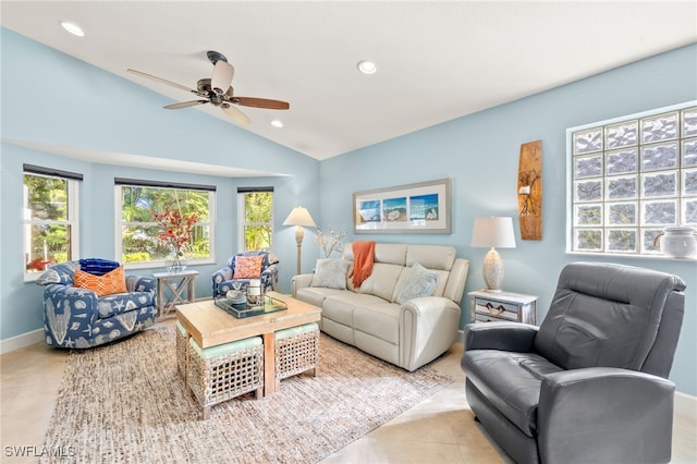 tiled living room featuring vaulted ceiling, ceiling fan, baseboards, and recessed lighting