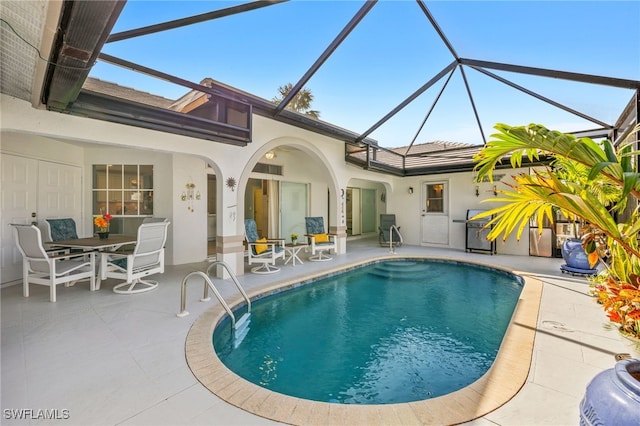 exterior space with outdoor dining area, a lanai, stucco siding, an outdoor pool, and a patio area