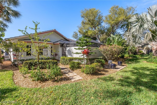 exterior space featuring a front yard