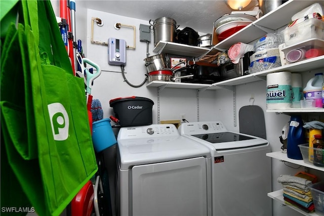 laundry area featuring laundry area and washer and clothes dryer