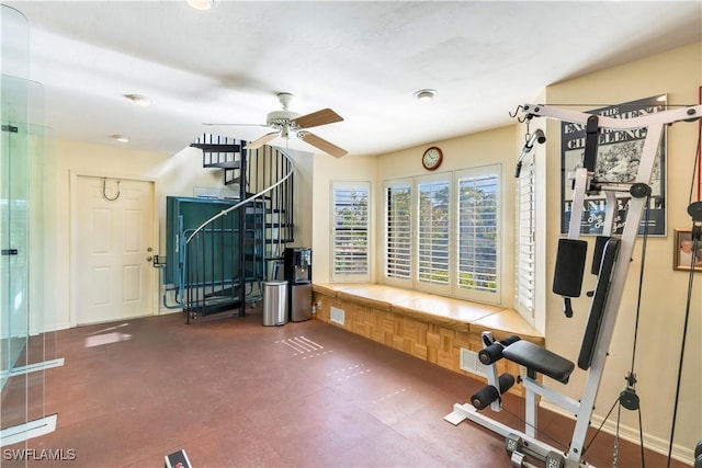 workout room featuring ceiling fan and visible vents