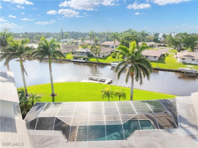 exterior space with a water view and a residential view