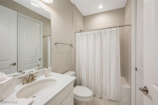 bathroom with recessed lighting, vanity, toilet, and shower / tub combo with curtain