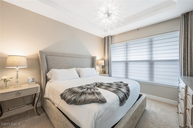 bedroom featuring ornamental molding, baseboards, a raised ceiling, and light colored carpet