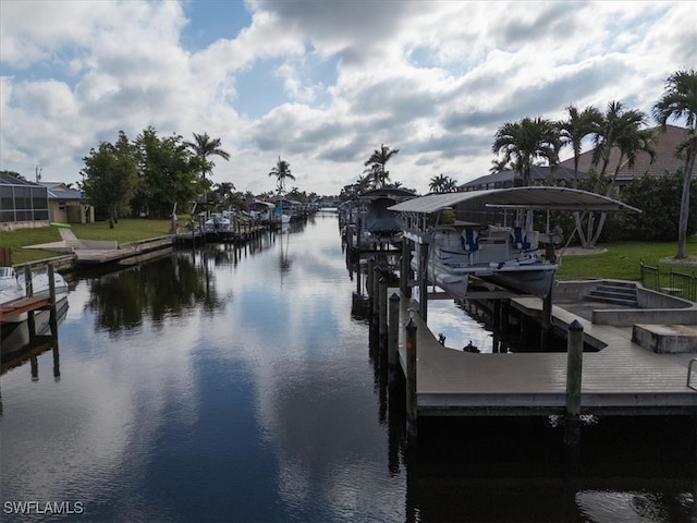 view of dock with a water view and boat lift